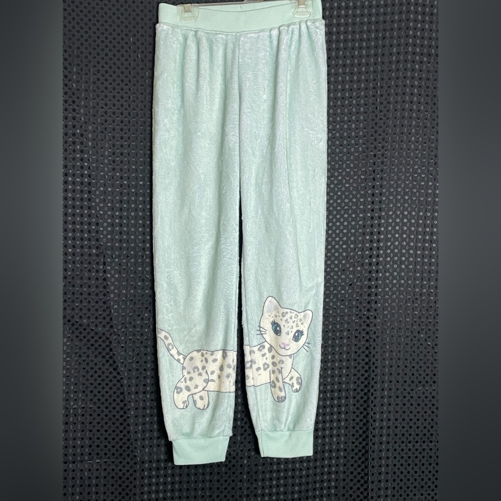 Justice for girls mint with leopard detail figure